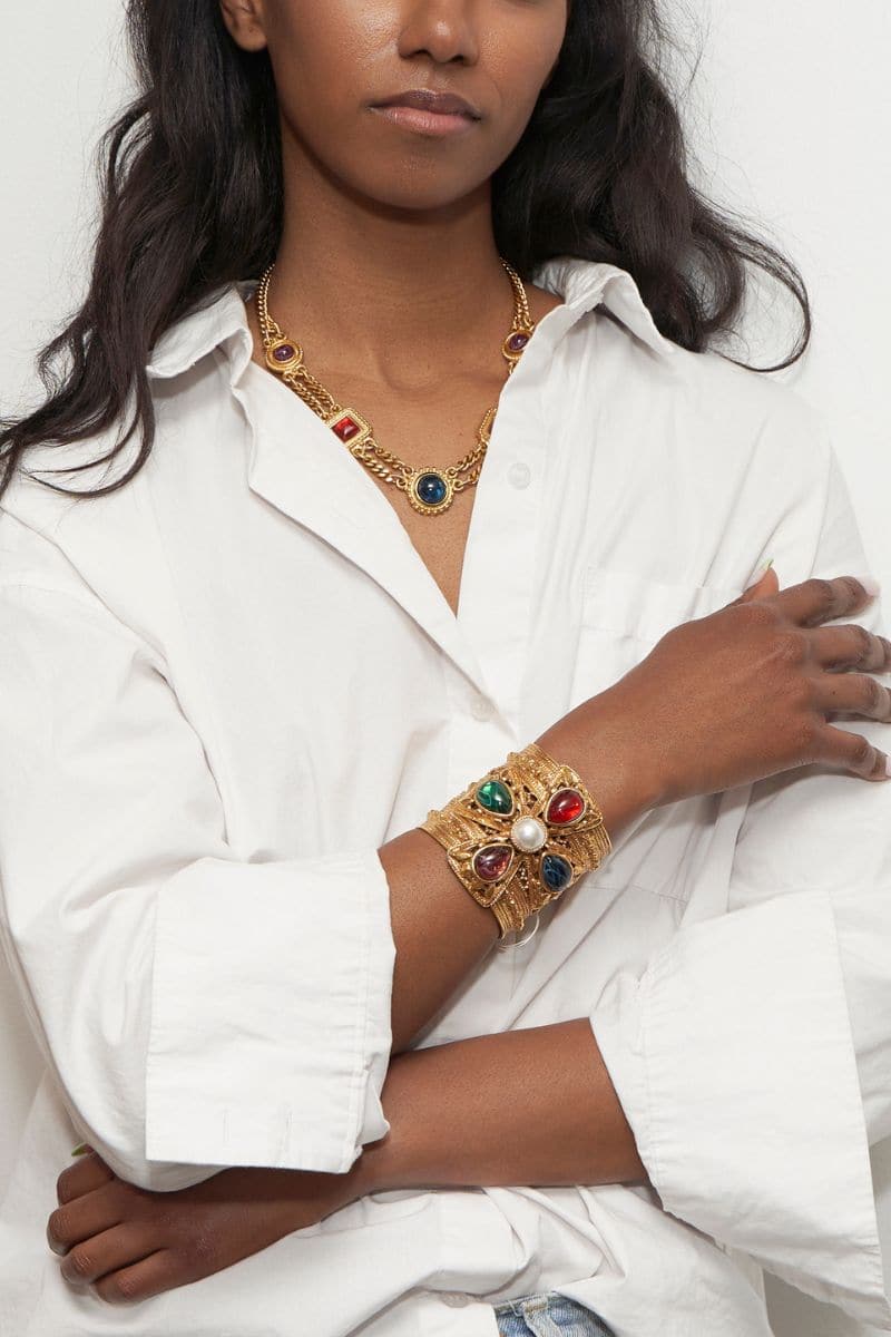 Ben Amun multistone gold arm cuff bracelet featuring a sleek, modern design with multicolored stones and a polished gold finish.