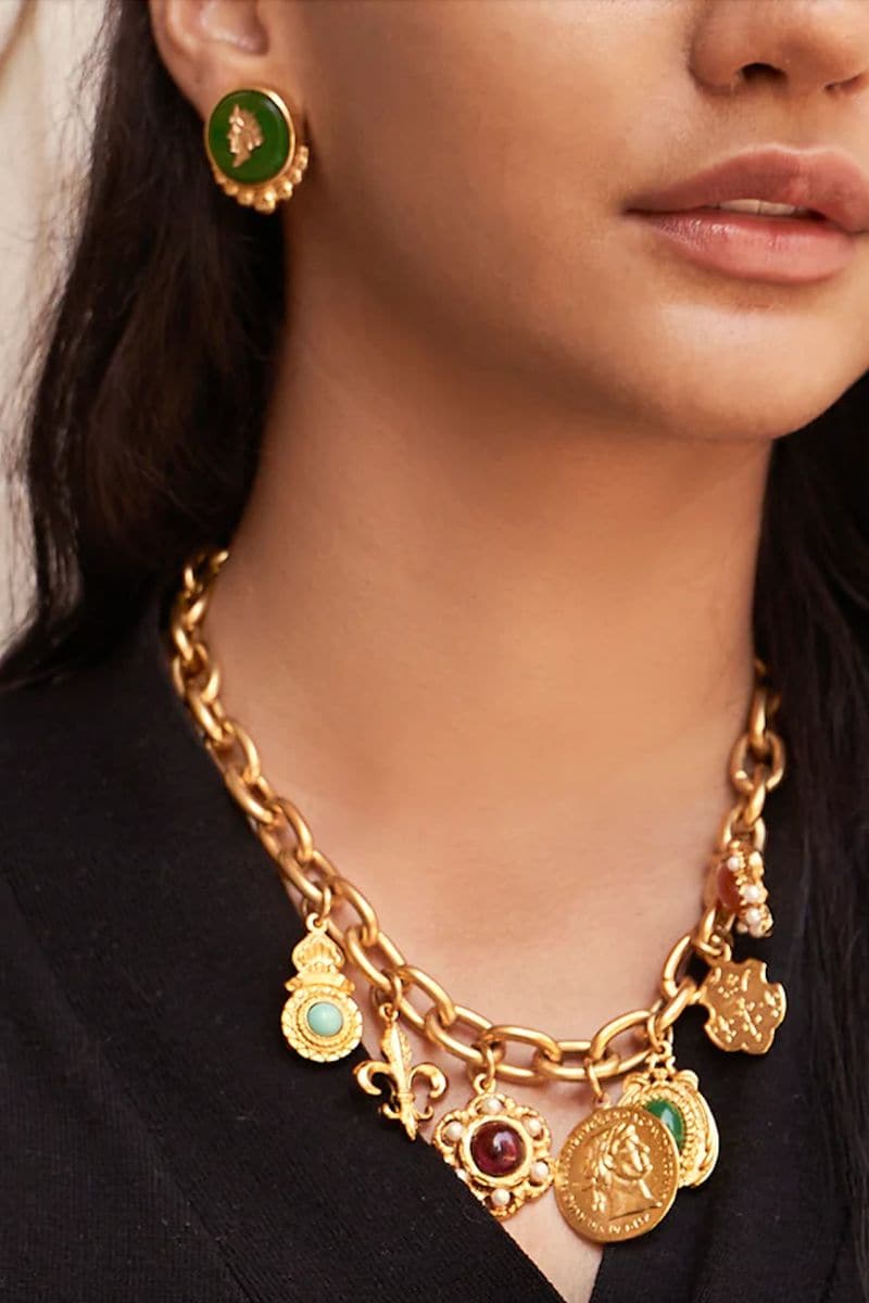 Ben Amun Pollock Gold Multi Charm Necklace featuring various gold charms on a delicate chain.