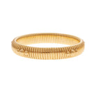 Gold-plated thin bangle bracelet by Ben Amun, showcasing a sleek and minimalist design on a neutral background.