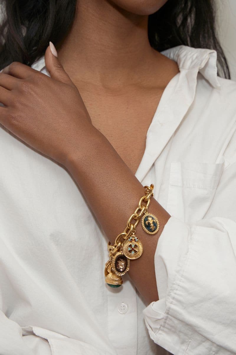Ben Amun Whistler Gold Multi Charm Bracelet featuring layered gold charms and intricate design.