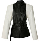 Black and white blazer jacket by Blikvanger, tailored fit, featuring classic lapels and sleek design, displayed on a hanger.