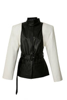 Black and white blazer jacket by Blikvanger, tailored fit, featuring classic lapels and sleek design, displayed on a hanger.