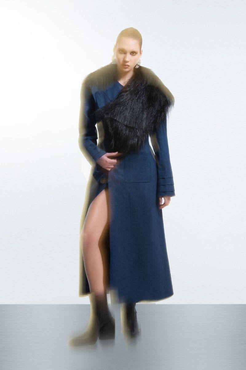 Blue denim furry long coat by Blikvanger, stylish outerwear with a cozy fur lining and tailored fit, shown in blue.