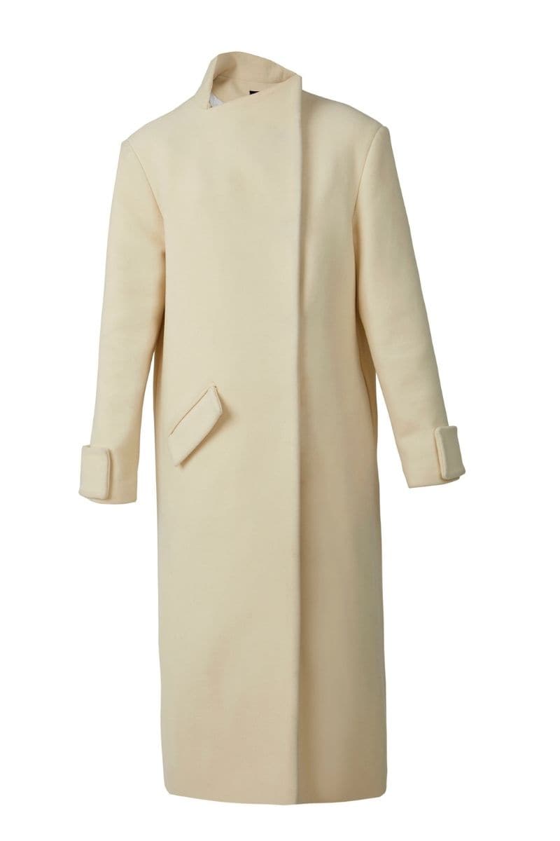 Milky white long coat by Blikvanger, showcasing a stylish, lightweight coat with a tailored fit and classic collar.