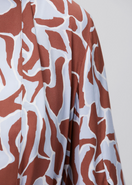 Maliluha Bonheur Kimono cover-up with floral patterns, lightweight fabric, and relaxed fit displayed in the image.
