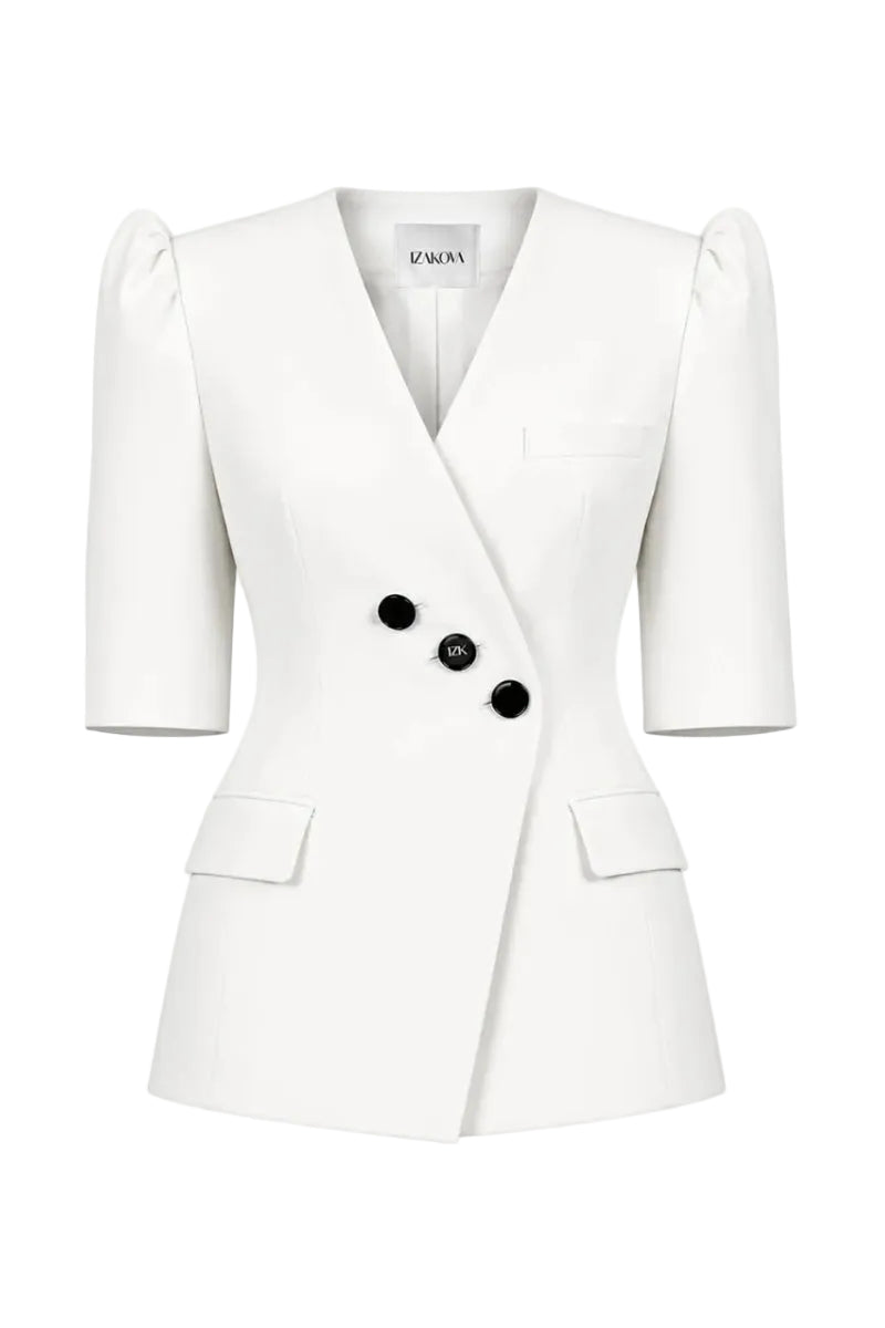 White Izakova BURA blazer with tailored fit and classic lapel, shown on a hanger against a plain background.