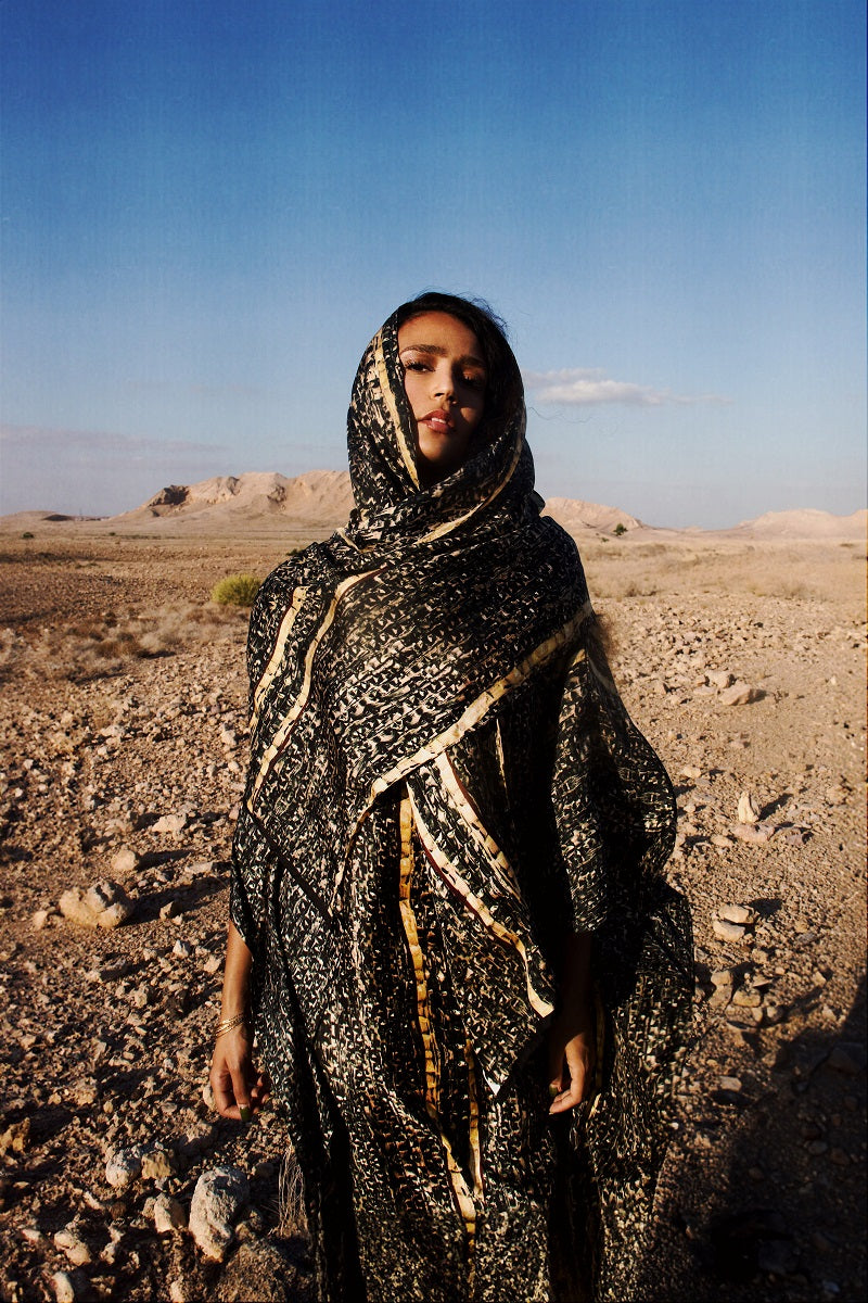 Brown Brocot kaftan maxi dress by Amel Batita featuring flowing fabric and intricate patterns, perfect for elegant summer wear.