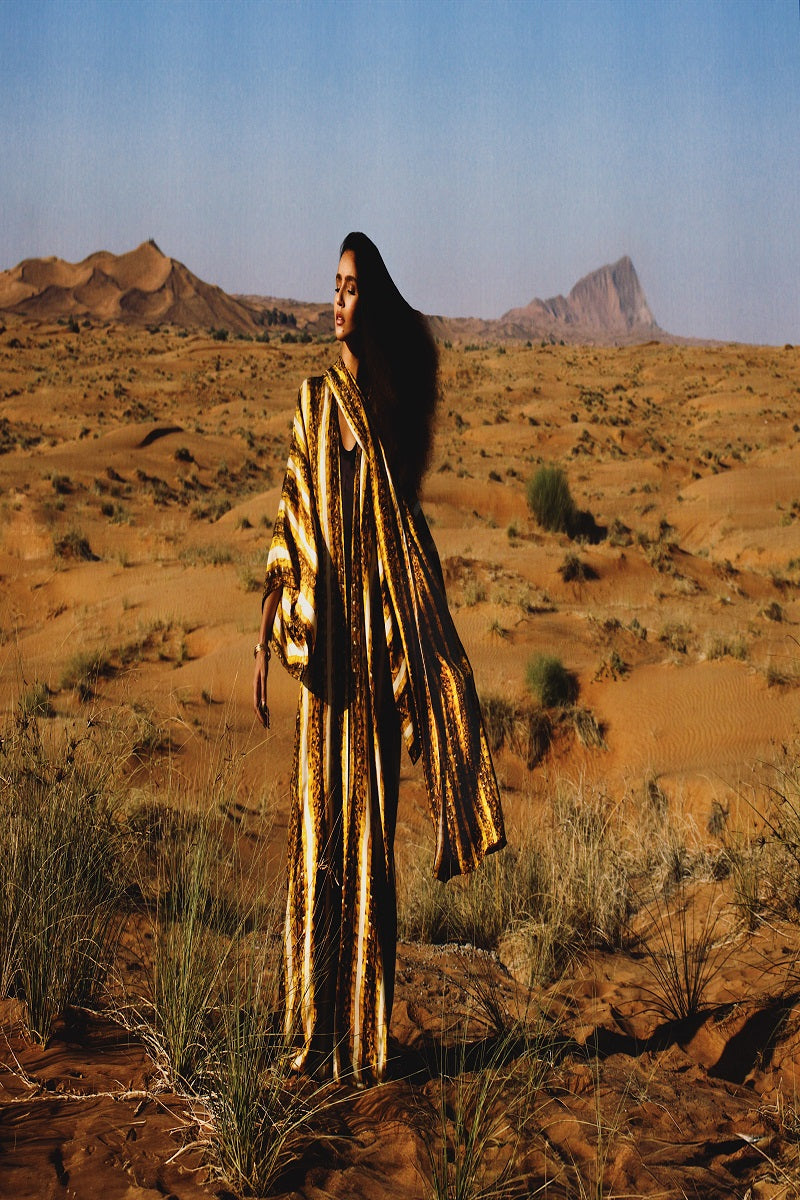 Gold Brocot kimono maxi dress by Amel Batita featuring flowing fabric and elegant design, perfect for stylish summer wear.