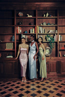 Aisl pink strapless maxi dress displayed on a model, flowing fabric, elegant design, perfect for summer or evening wear.