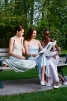 Ice blue strapless maxi dress by Aisl, flowing fabric, elegant design, shown on a model for a summer evening look.