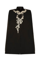 Nadya Shah Cape Nocturne jacket shown from the back, stylish black outerwear with a flowing, elegant design.
