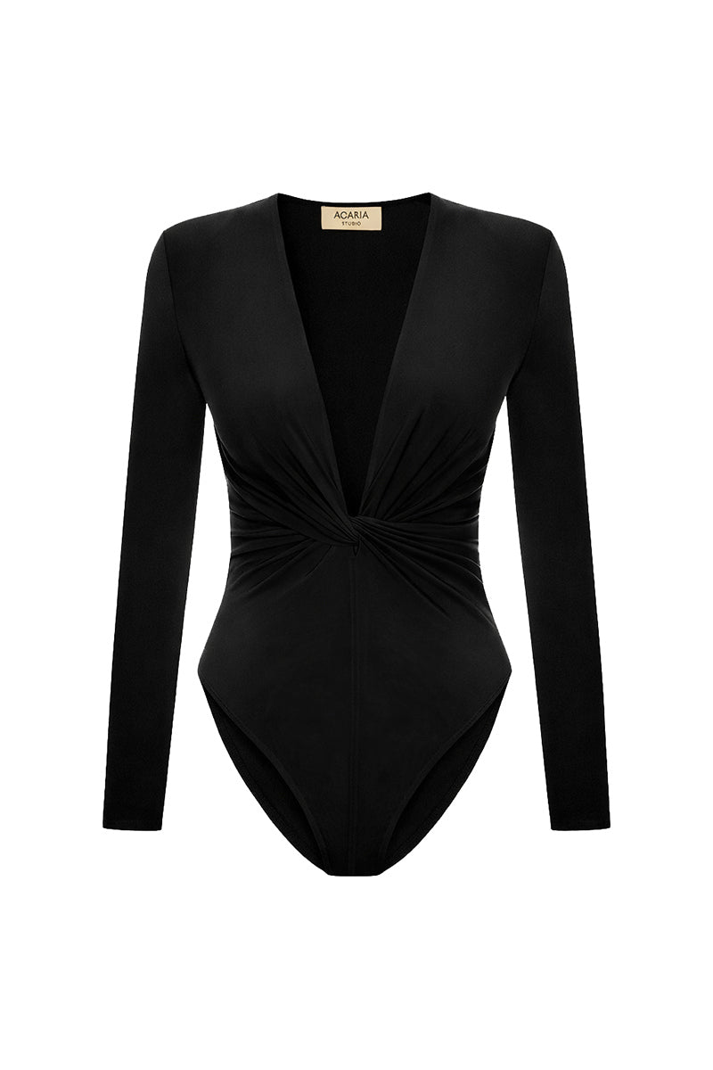 Black Chandra bodysuit from Acaria Studio, a stylish fitted top with long sleeves and a sleek, modern design.
