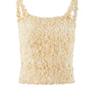 Beige Nora tank top by Chictopia, sleeveless top with a relaxed fit and round neckline, shown on a white background.
