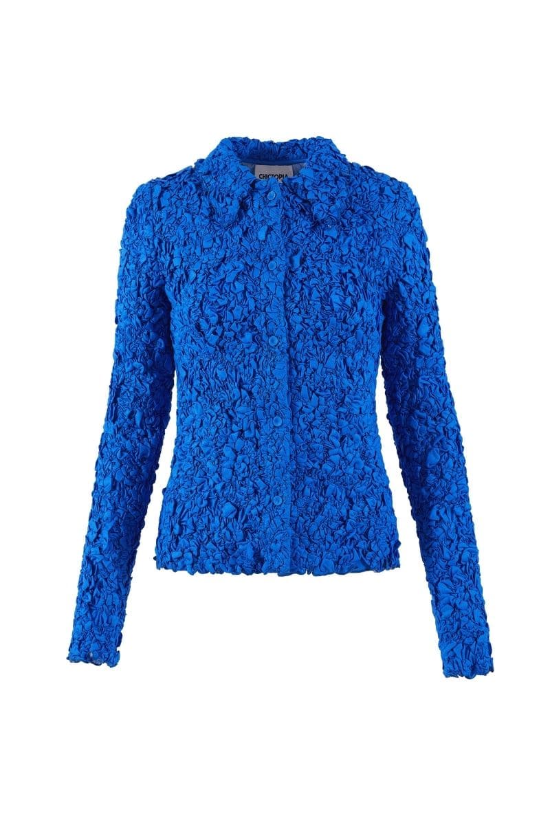 Navy blue smocked shirt by Chictopia, featuring a fitted bodice and short sleeves, displayed on a hanger.