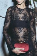 Red velvet box clutch featuring a chili design by Sarah's Bag, stylish accessory with a compact, elegant shape.