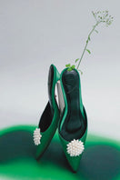 Forest green kitten heels by Christin Wu, featuring a sleek design, pointed toe, and elegant heel height.