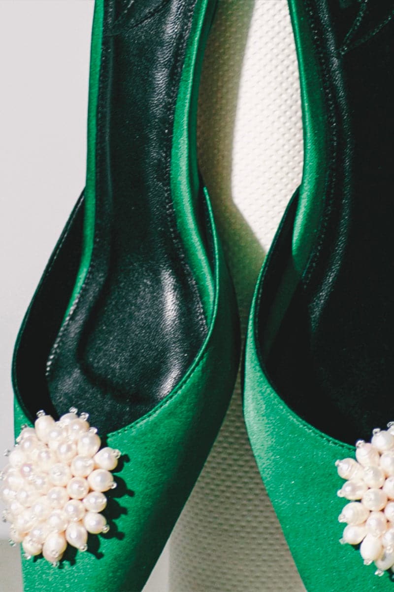 Forest green kitten heels by Christin Wu featuring a sleek design and pointed toe, size EU 36.