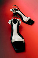 Christin Wu Penny Two-Tone Sandals in black with ankle straps and open toe design, European size 36