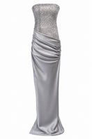 Urban Muse Clarisse grey gown with flowing fabric and elegant design, styled for a sophisticated evening look.