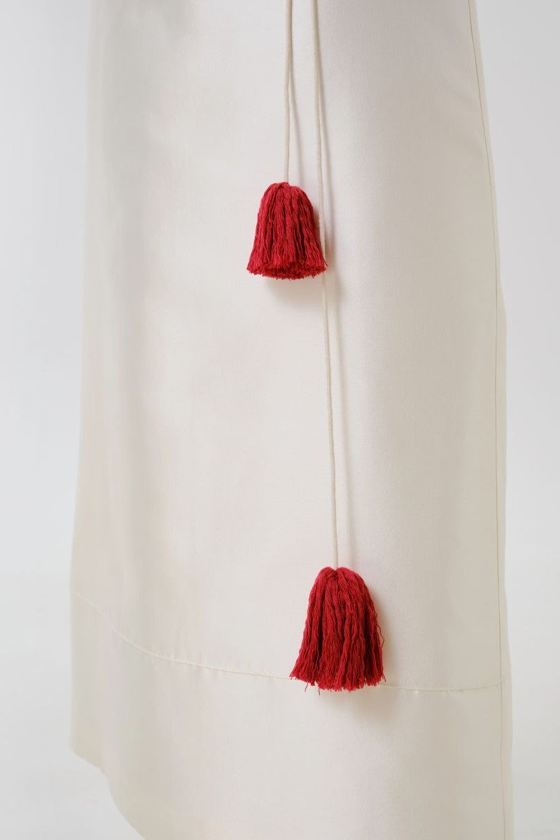Close-up of a DELEGAN velvet blush silk midi skirt showing soft fabric texture and elegant drape.