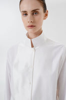 Close-up of the DELEGAN STILL LINE SHIRT showing fabric texture and stitching details.