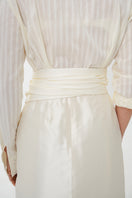Close-up of the back of DELEGAN Milk Textured Shirt showing detailed fabric texture and stitching on a stylish shirt.