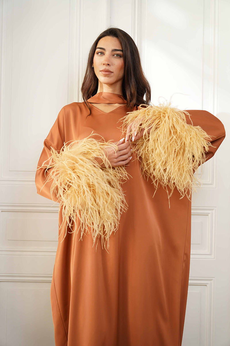 Close-up of Joanna Andraos CULT MIA X Joanna Andraos Amber Silk-Effect Gown showing smooth, luxurious fabric and elegant design details.