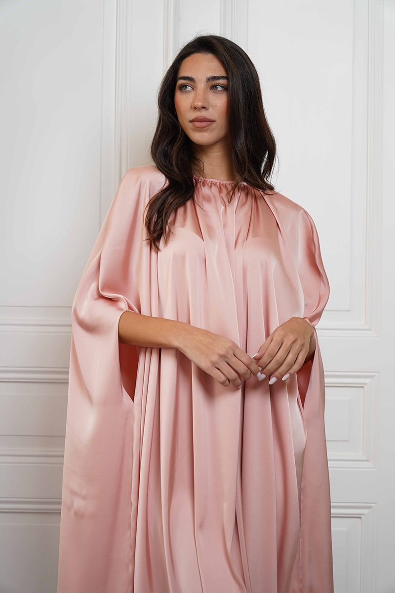 Close-up of Cult Mia X Joanna Andraos soft nude silk gown fabric showing smooth, luxurious texture and delicate stitching.
