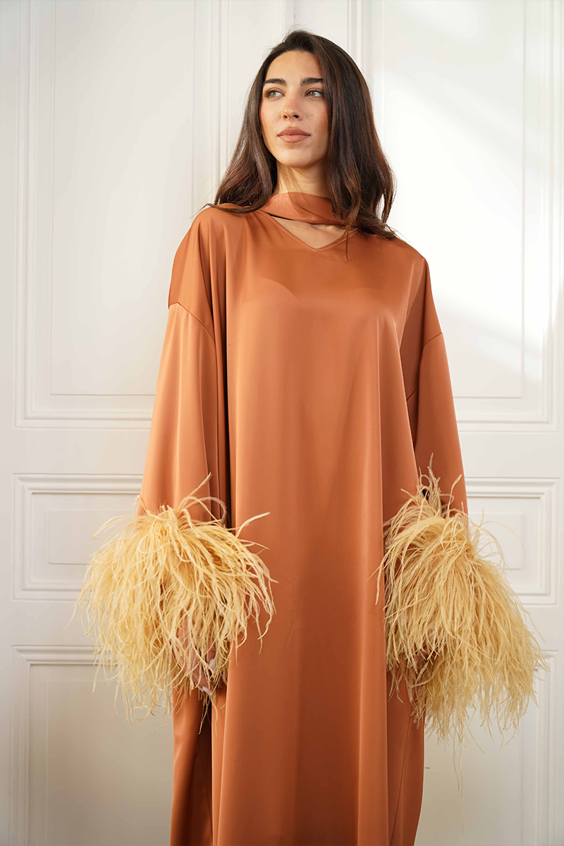 Close-up of Joanna Andraos CULT MIA X Joanna Andraos Amber Silk-Effect Gown showcasing silky fabric and elegant design.