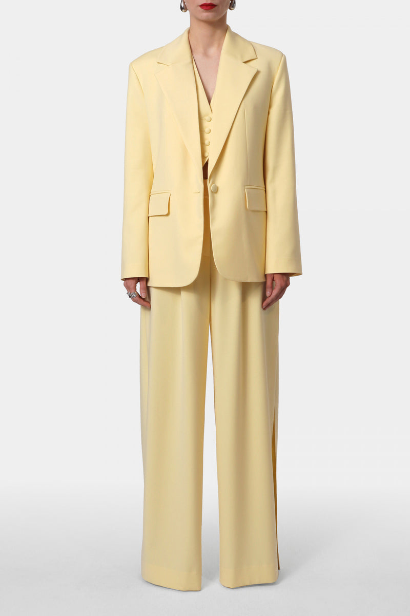 Yellow blazer by AGGI by HALEWSKI, the Tatiana Butter Blazer featuring a tailored fit and classic lapel design.