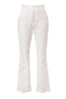 Off-white embroidered pants by AGGI by Halewski featuring detailed embroidery and a relaxed fit.