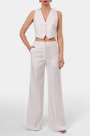 Off-white AGGI by HALEWSKI Franzi pants, stylish and tailored, shown on a model with a sleek fit and minimalist design.