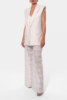 Off-white Ursula vest by AGGI by Halewski, stylish sleeveless top with a modern design, showcased in the image.
