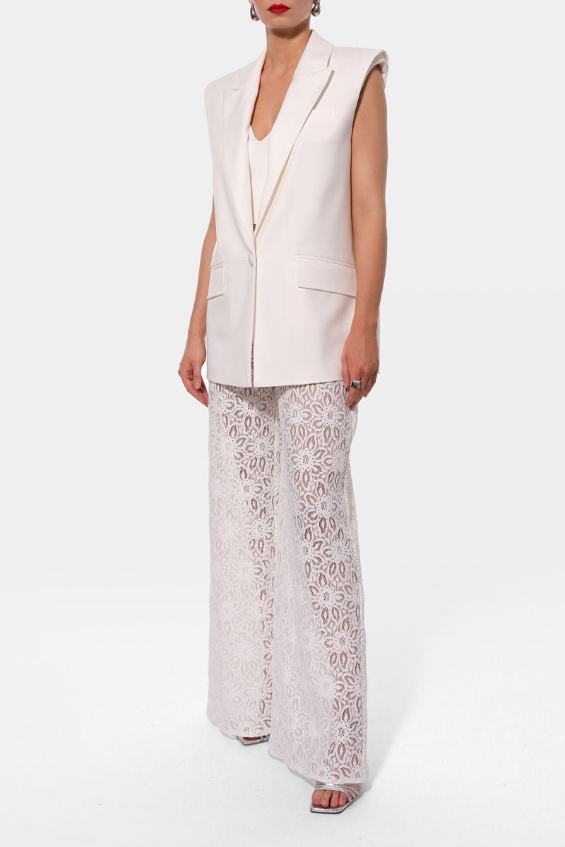 Off-white Ursula vest by AGGI by Halewski, stylish sleeveless top with a modern design, showcased in the image.
