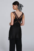 Aethera BRANKA X-Large Sequin Scrunchie in shiny, colorful sequins, styled in hair as a fashionable hair accessory.