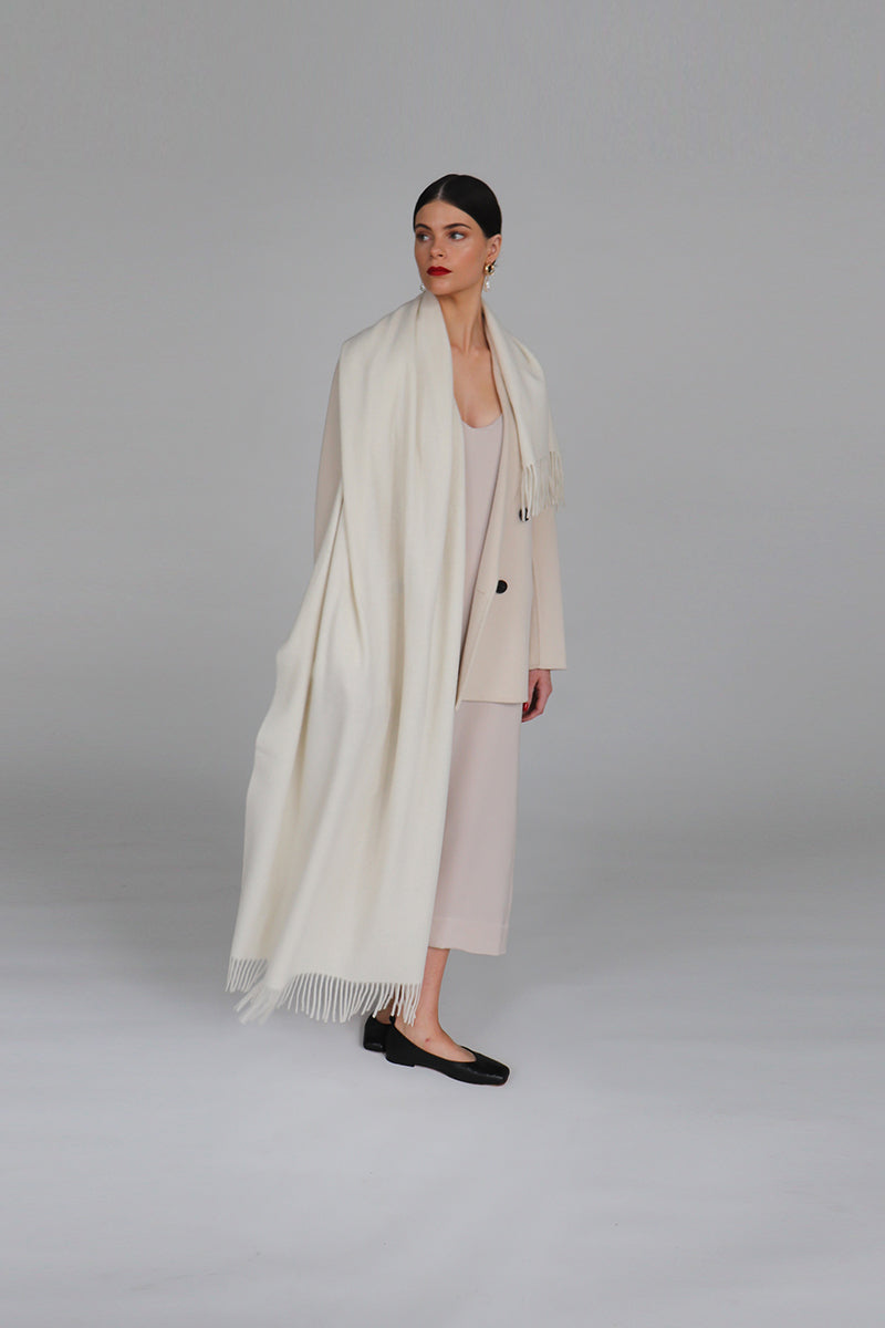 Aethera Helena cashmere shawl in elegant blanc, draped fabric with soft texture, perfect for stylish warmth and layering.
