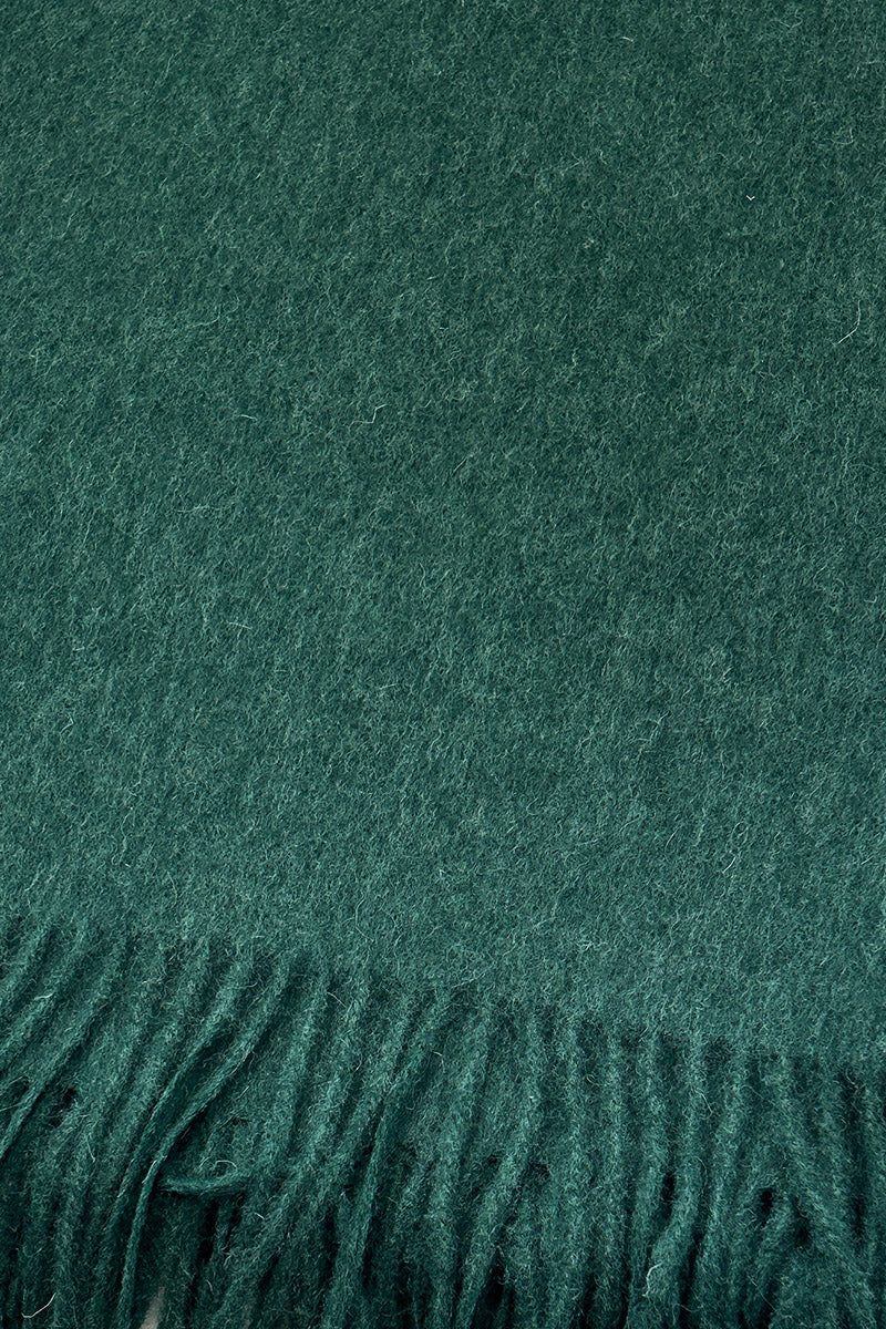 Aethera Serene Lambswool Shawl in vibrant chartreuse, showcasing its soft texture and stylish drape.