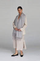 Aethera Helena cashmere shawl in marle, draped elegantly showing soft, textured fabric and cozy, luxurious design.