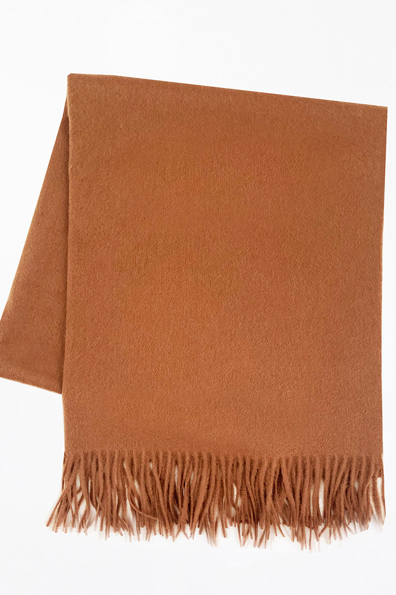 Aethera Helena cashmere shawl in birch color, soft and cozy wrap draped over a neutral background.