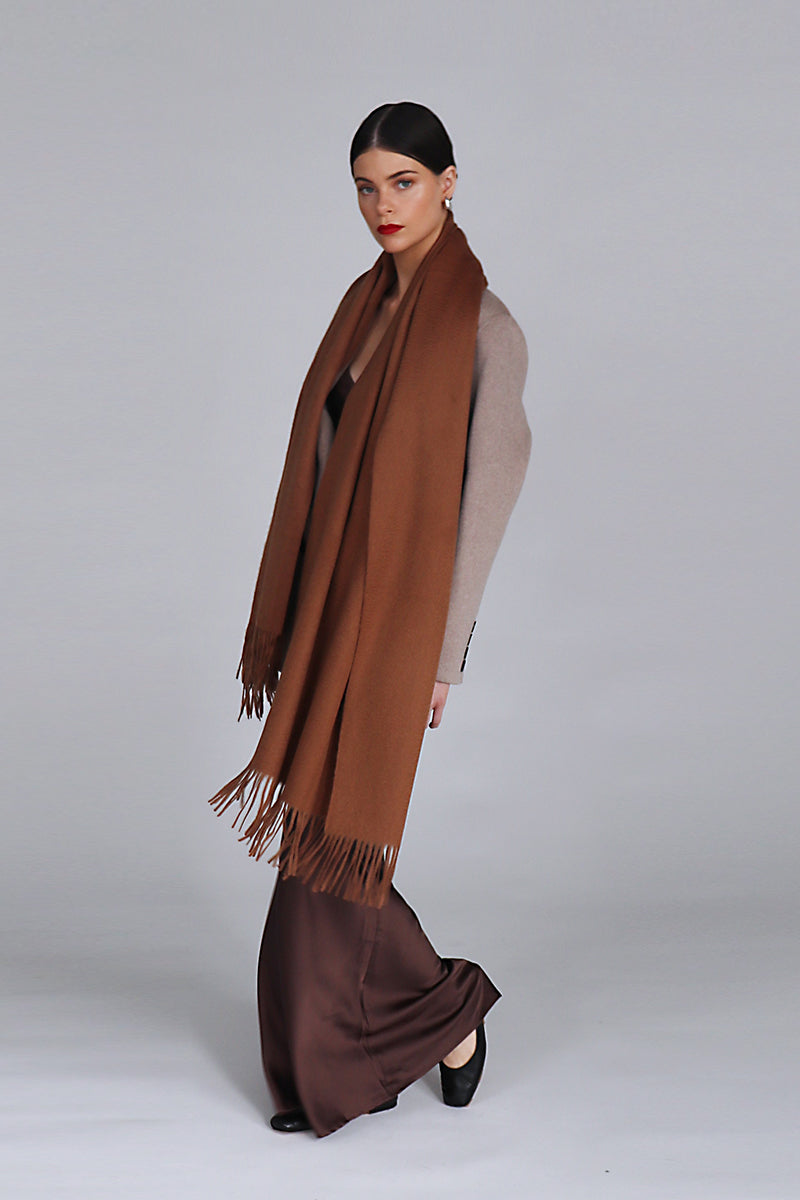 Aethera Helena cashmere shawl in Birch color, showcasing its soft, luxurious fabric and elegant drape around the shoulders.