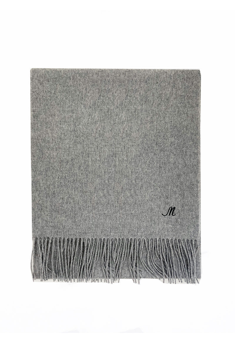 Aethera Helena cashmere shawl in steel color, draped to showcase soft, luxurious fabric and elegant design.