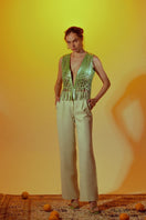 Electric lime green Attalea leather vest by Double A, featuring a sleek design and vibrant color, shown on a white background.