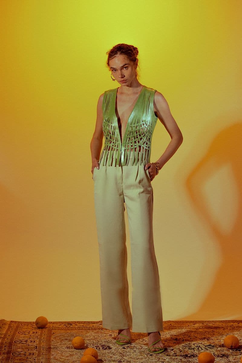 Electric lime green Attalea leather vest by Double A, featuring a sleek design and vibrant color, shown on a white background.
