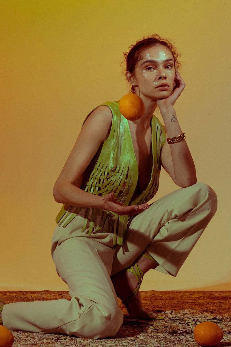 Electric lime green Attalea leather vest by Double A, featuring a stylish, fitted design and smooth leather texture.