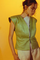 Electric lime green Ausborn leather vest by Double A, shown in XS size with detailed leather texture and front zipper.