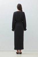TAGG V-neck XUXU maxi dress featuring a flowing silhouette and elegant design, perfect for stylish summer occasions.