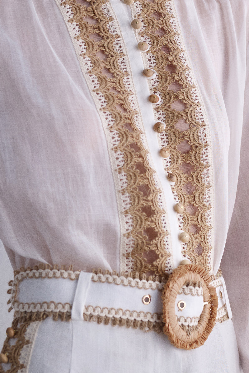 AISA Dune shirt displayed on a hanger, featuring a stylish design and casual fit made from comfortable fabric.
