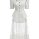 Ivory Romance set by White Plan, stylish co-ord outfit featuring a matching top and trousers in soft ivory fabric.