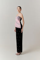 Elegant wave-embellished gown with crystal accents from Happy Clothing, featuring flowing fabric and intricate design details.