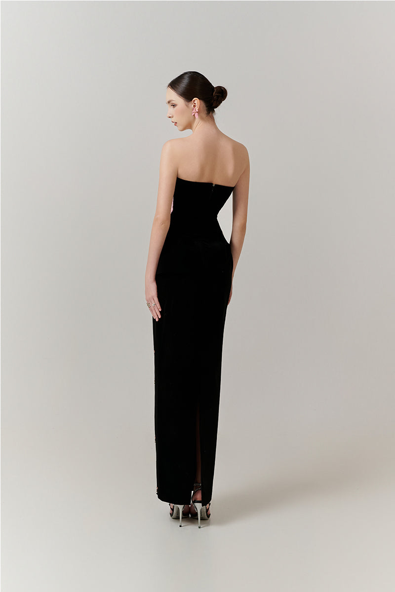 Elegant wave-embellished gown with crystal accents by Happy Clothing, showcasing intricate detailing and flowing fabric.